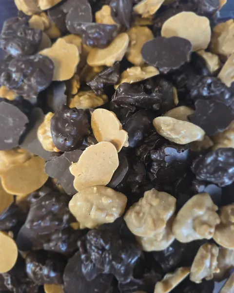 Crispy clusters treats in dark and cream paw shapes